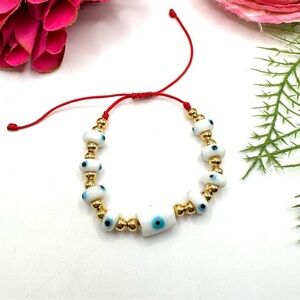 NEW⚜️Spun Glass White Evil Charm Bracelet